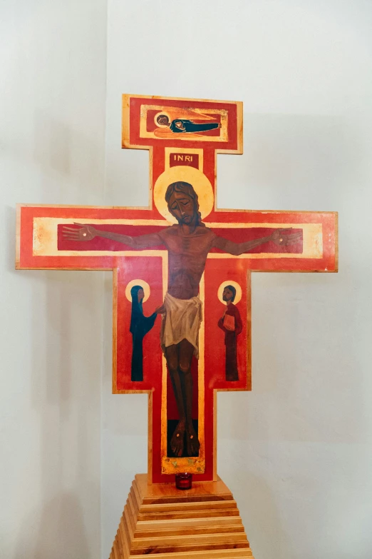 this is a cross of the crucifix with paintings on it