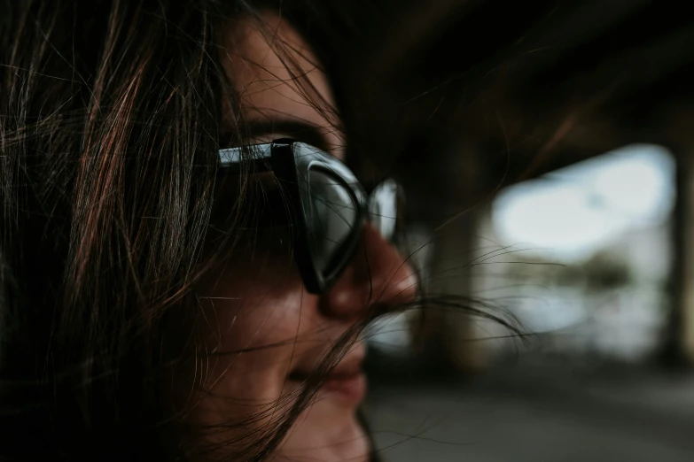 a close up of the glasses on top of a person