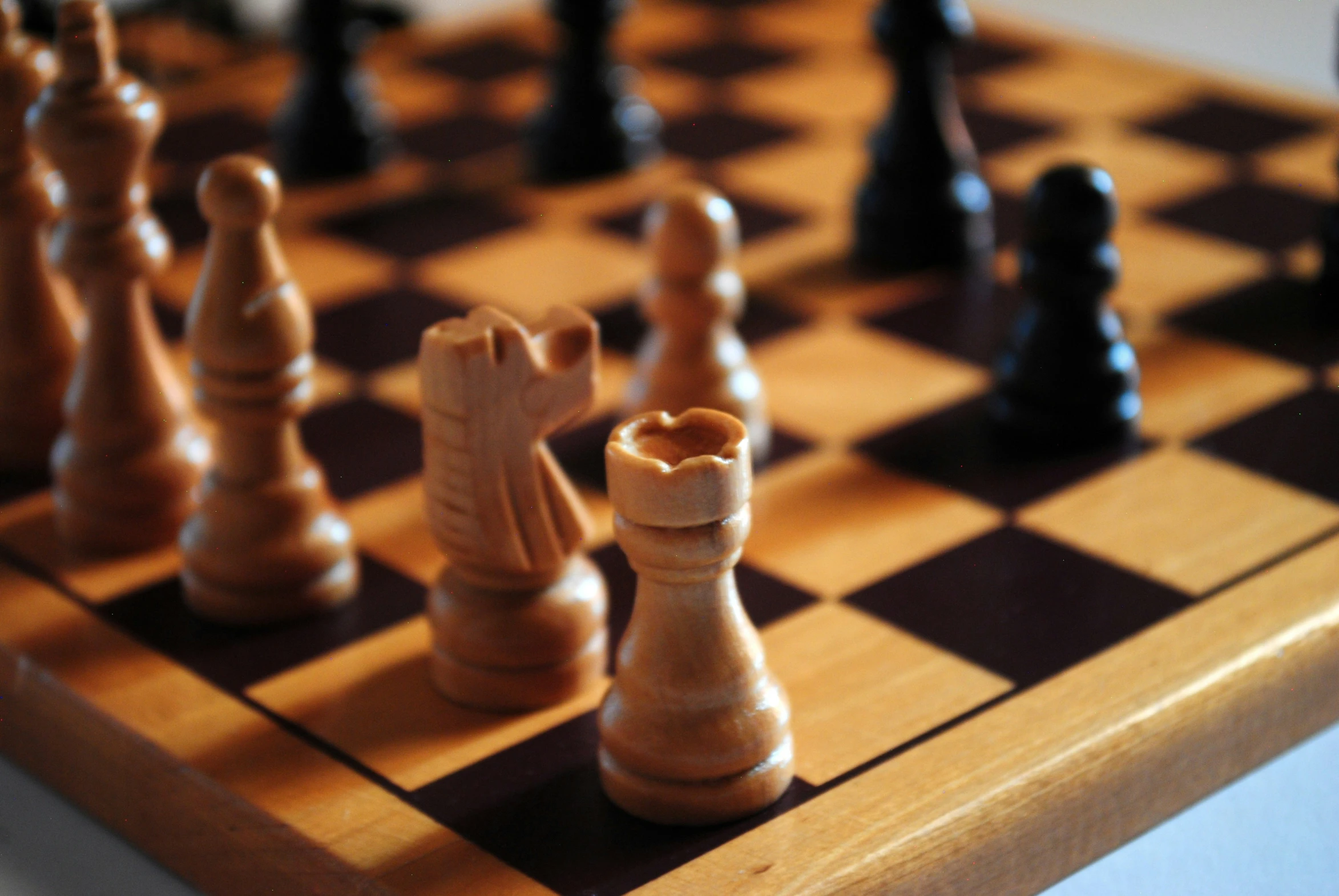 a large chess board with some pieces on it