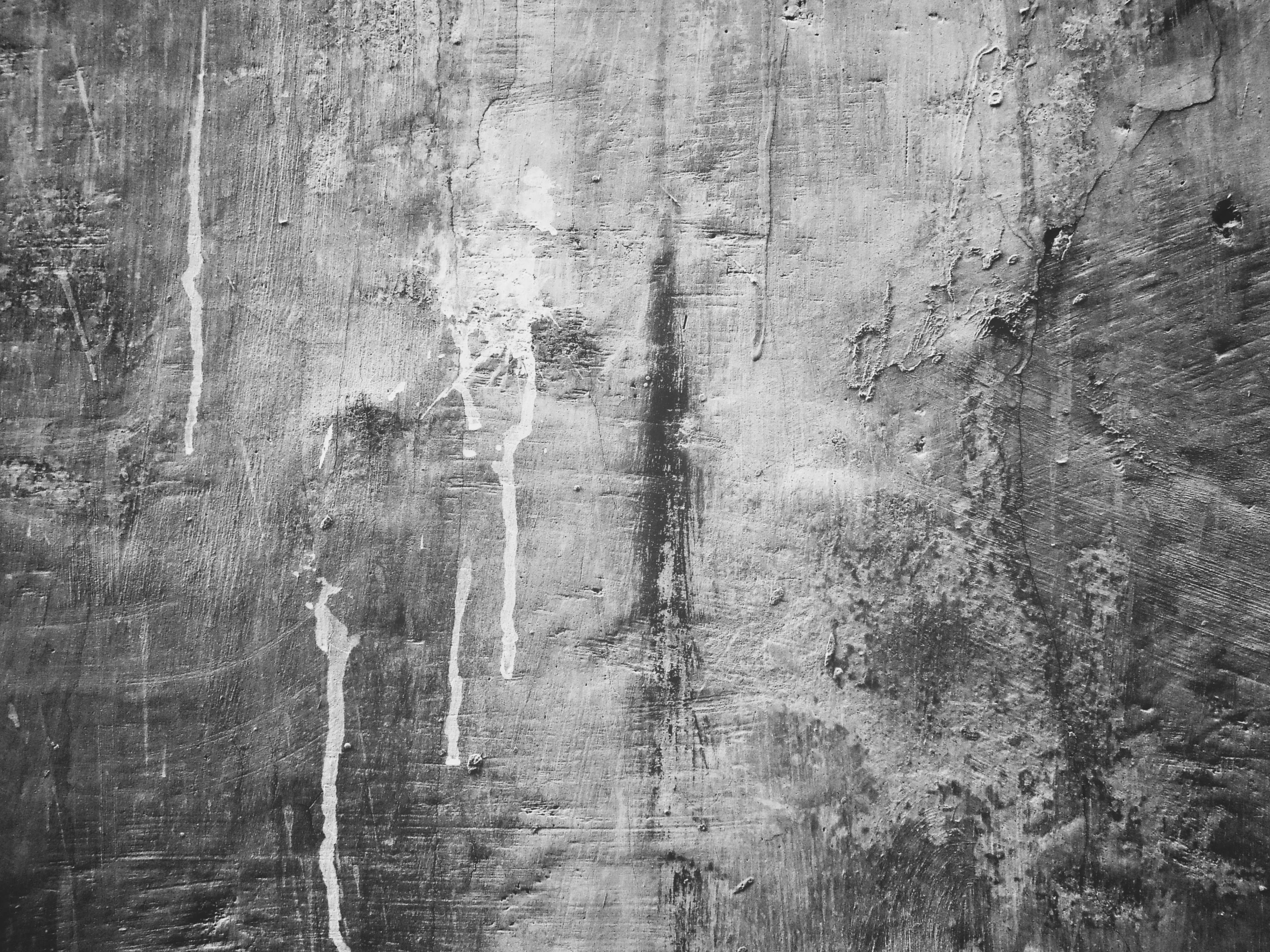 black and white pograph of abstract grungy patterns on a wall