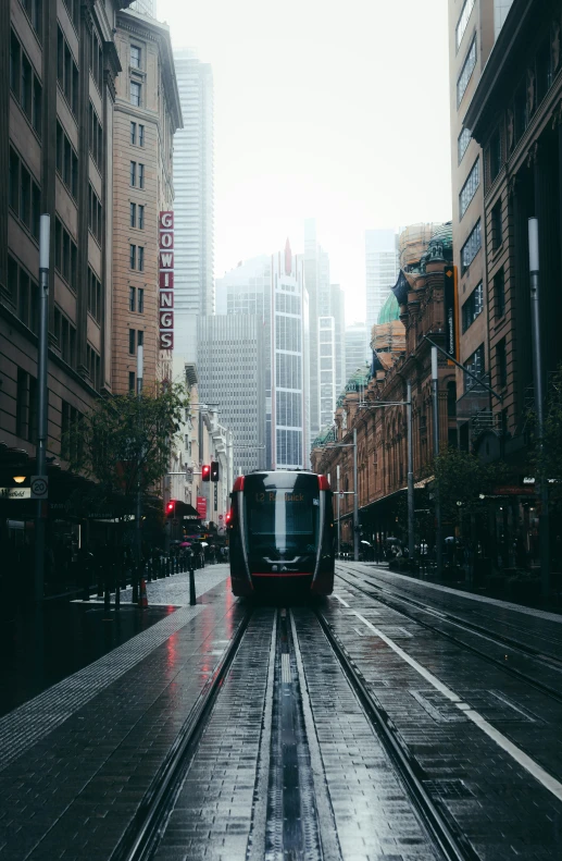 an abstract picture of a subway car riding along the street
