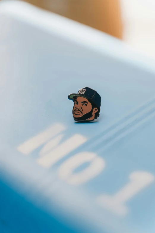 a close up of a sticker of a person on the hood