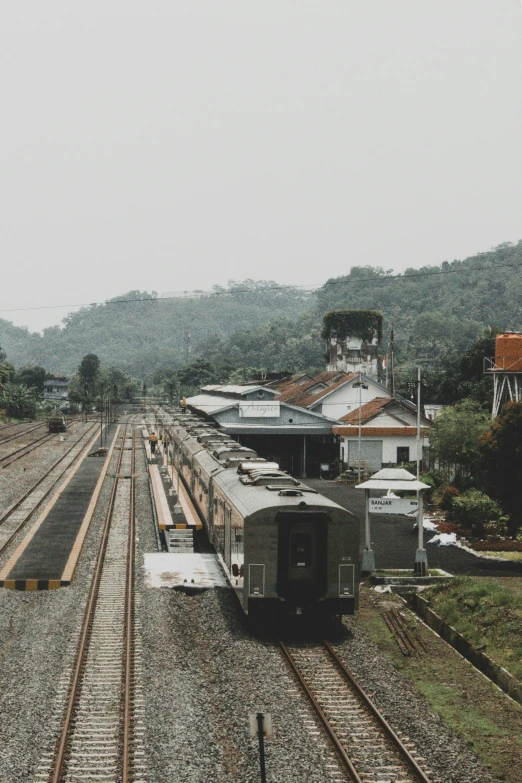 a train is rolling down the railroad tracks