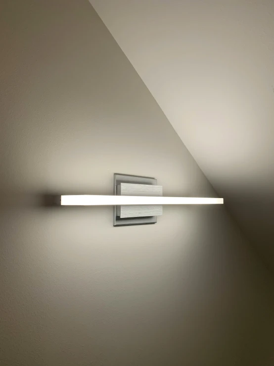 a wall light with one light and no head