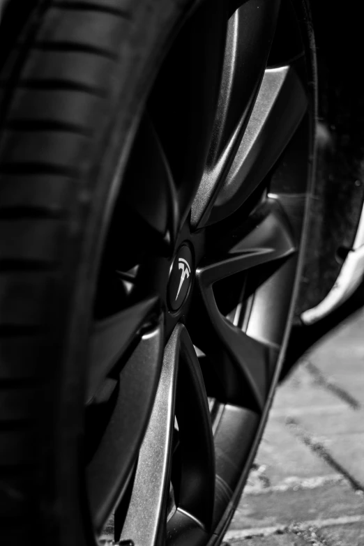 a black and white po of a car tire