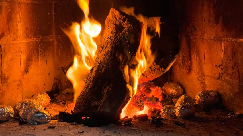a fire blazing in a wood burning stove