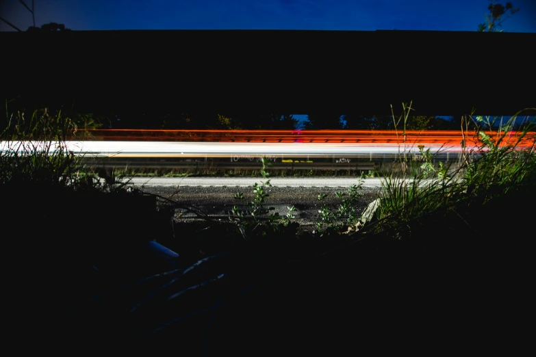 a long - exposure po taken from the ground looking at an urban setting
