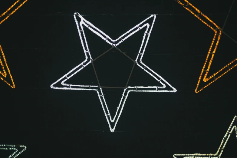 a close up of some lights that are in the shape of a star