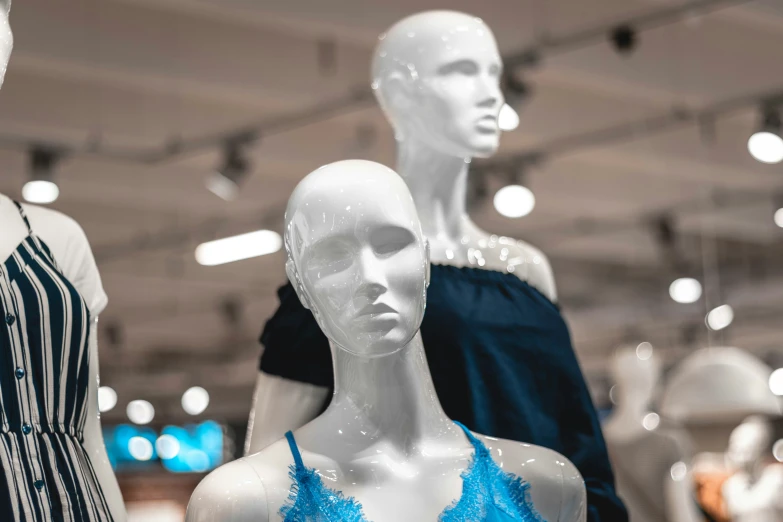 a store display with mannequins on display