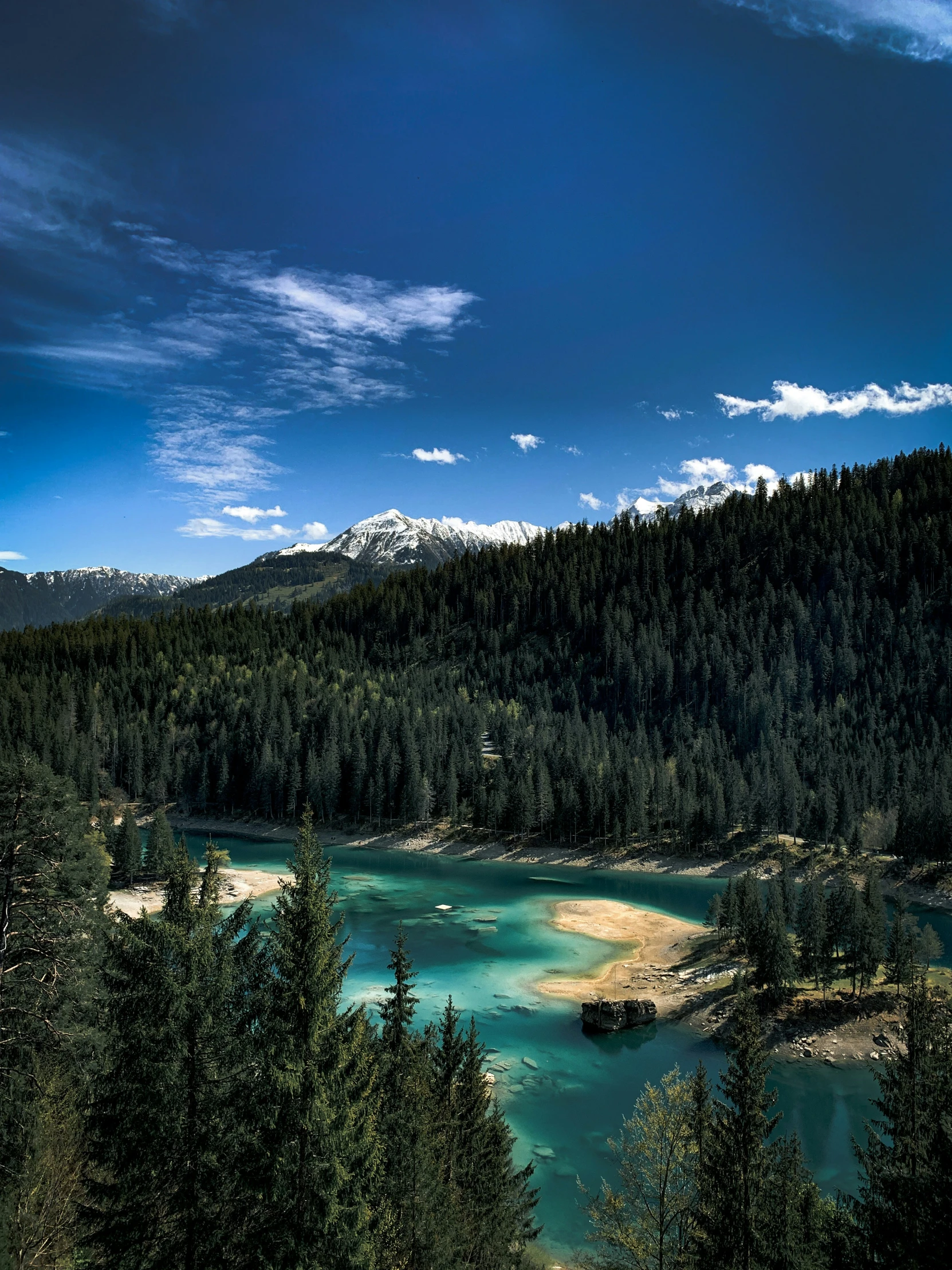 a lake nestled in the side of a mountain