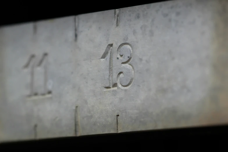 a close up of a metal container with numbers inside