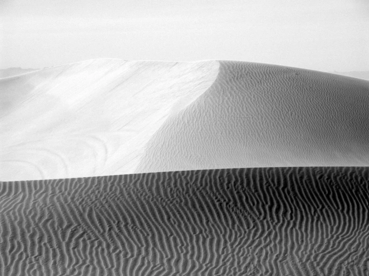 a large dune with the shape of a mountain