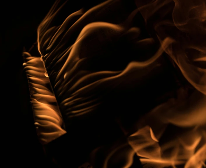 flames in the dark on a black background