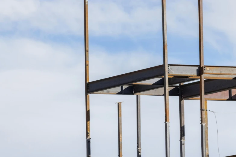 the structure of an industrial building under construction with metal structures