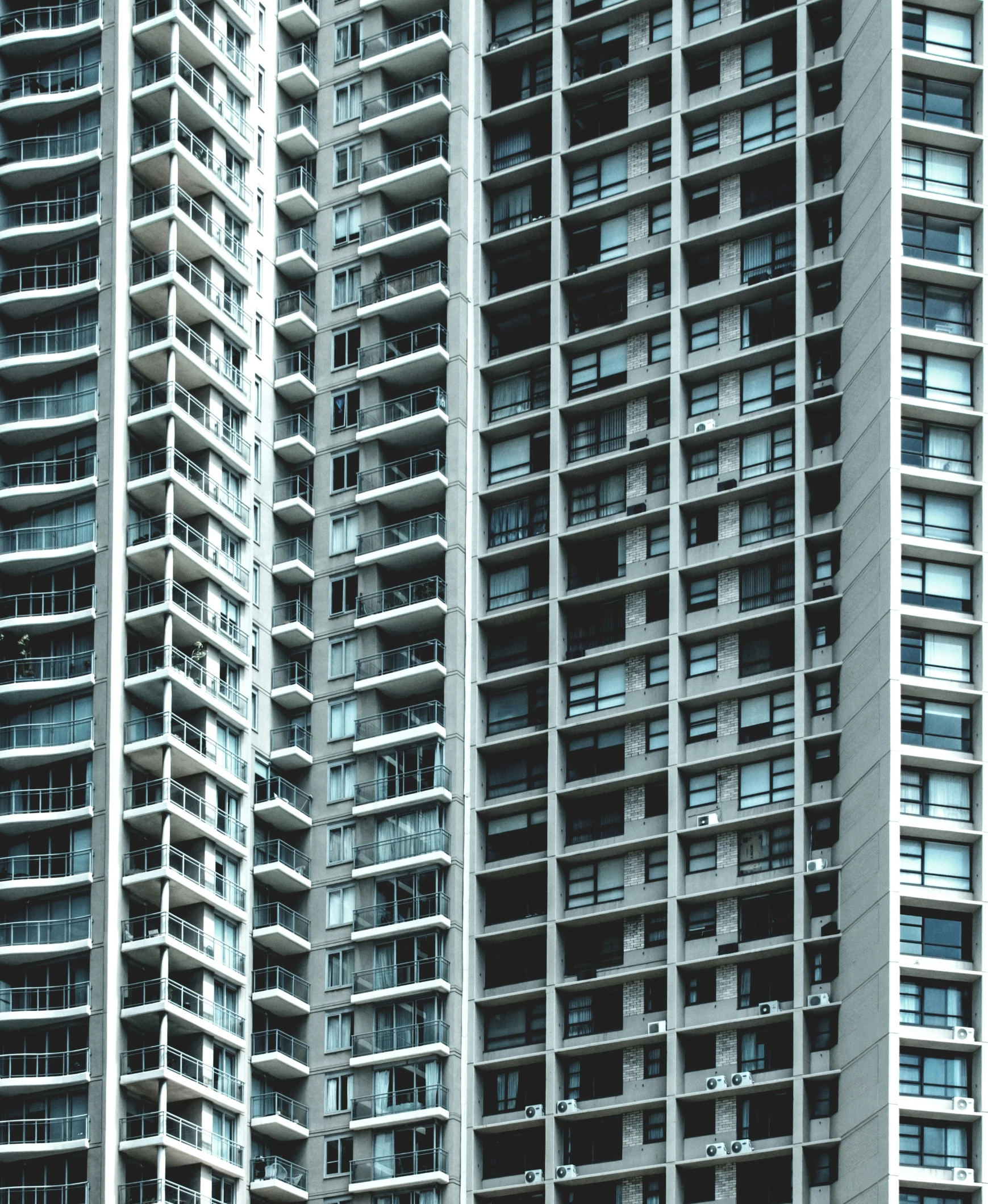 the front and back side of two tall buildings