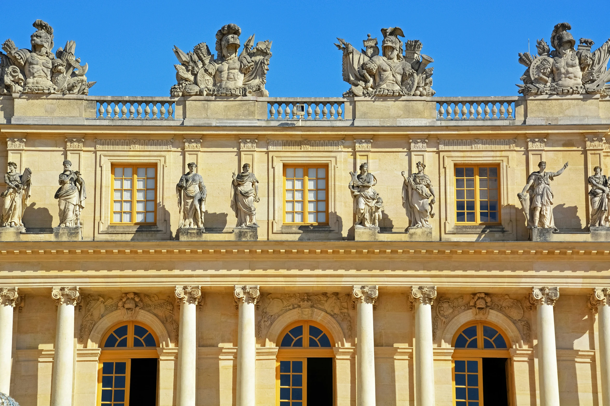 a building that has statues on top of it