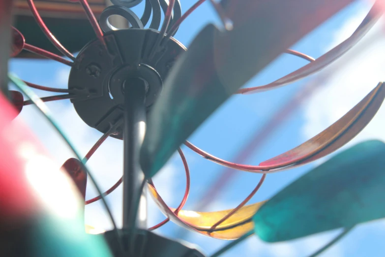 an umbrella with multiple colored lights behind it