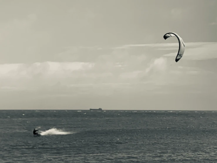 a person para sailing in the water with a sail