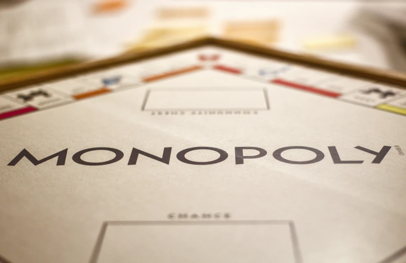 an monopoly board game with several players on it