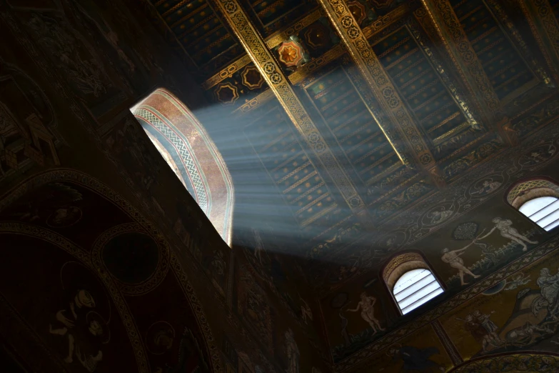 sunlight streaming through windows in a fancy building