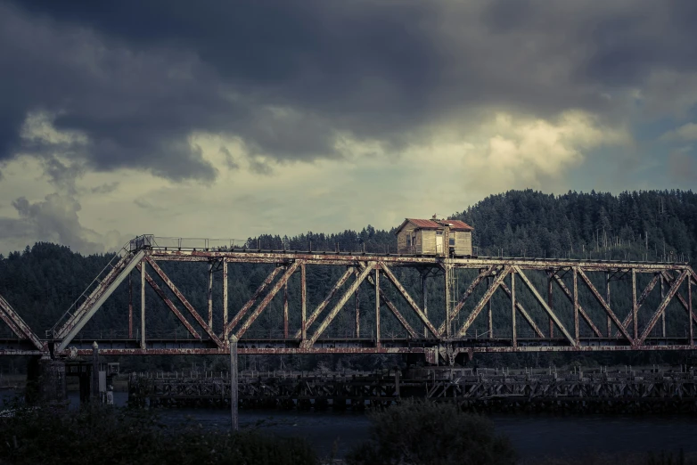 a view of an old bridge over a body of water