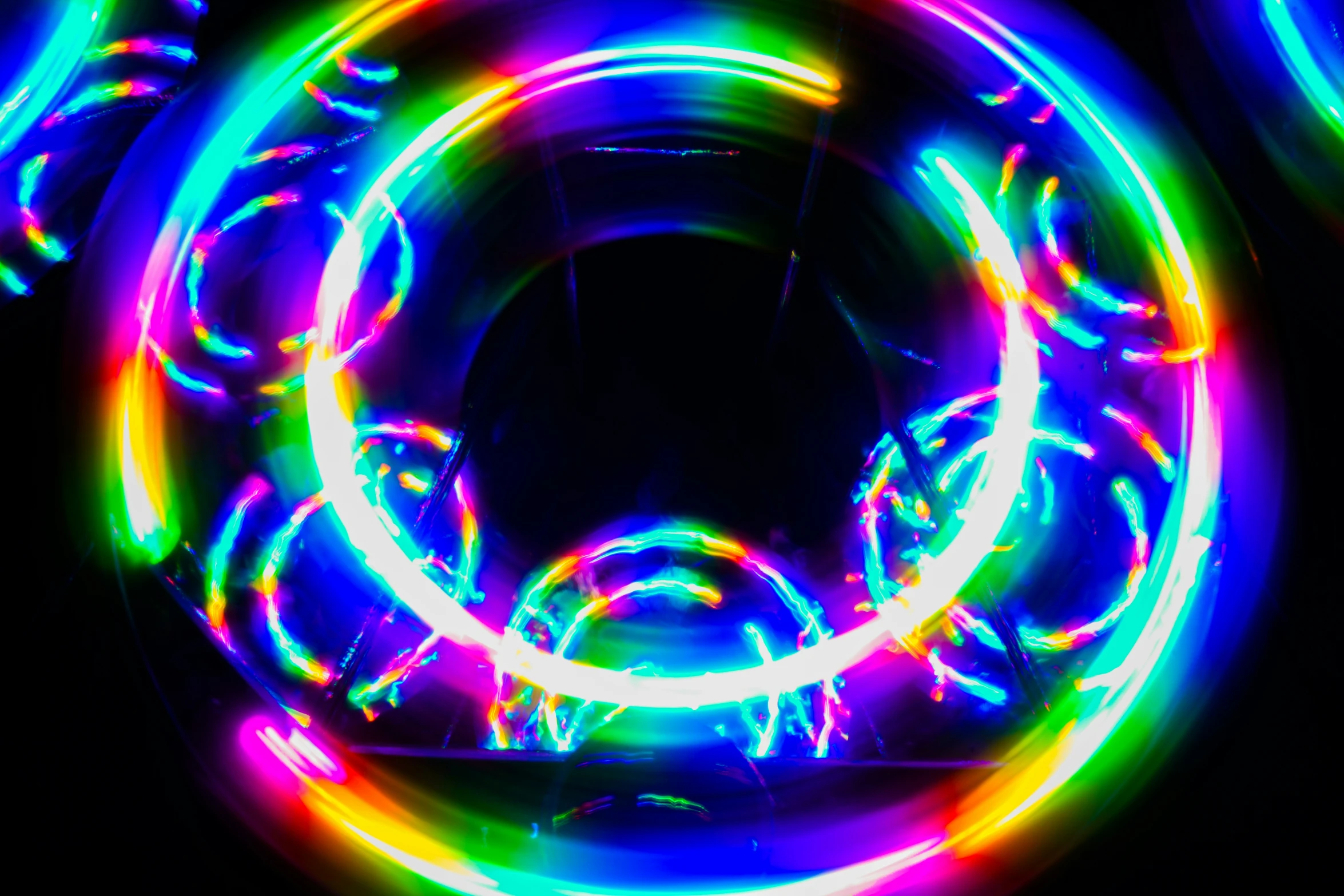 an illuminated circle is shown against a black background