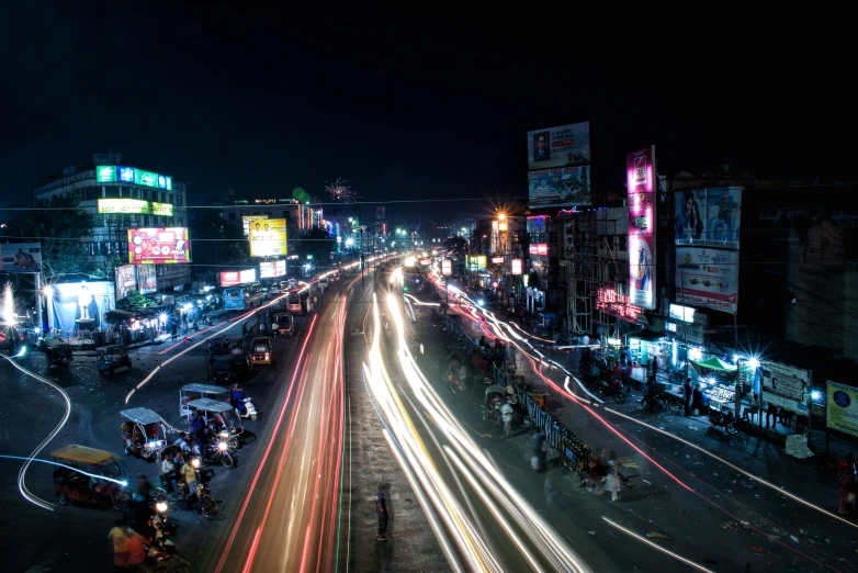 a group of traffic moves along a busy highway