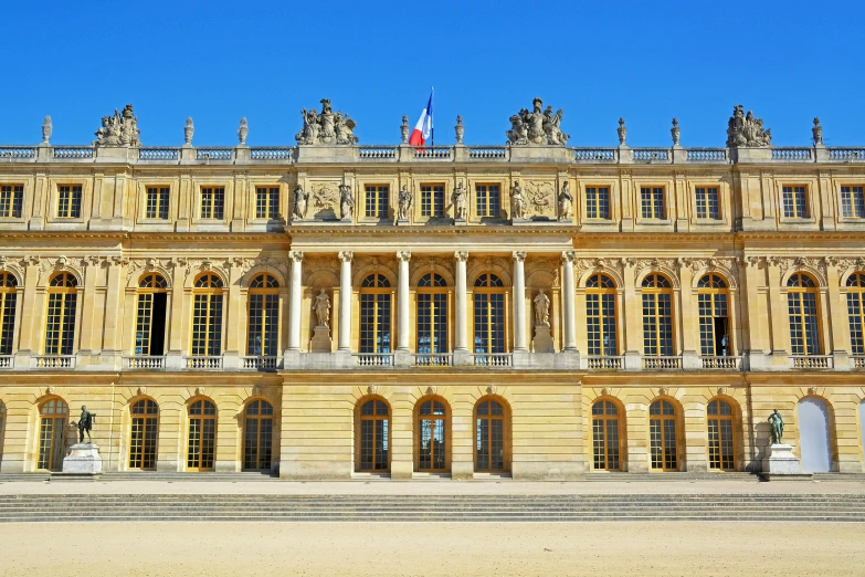 an image of a big building with some steps outside it