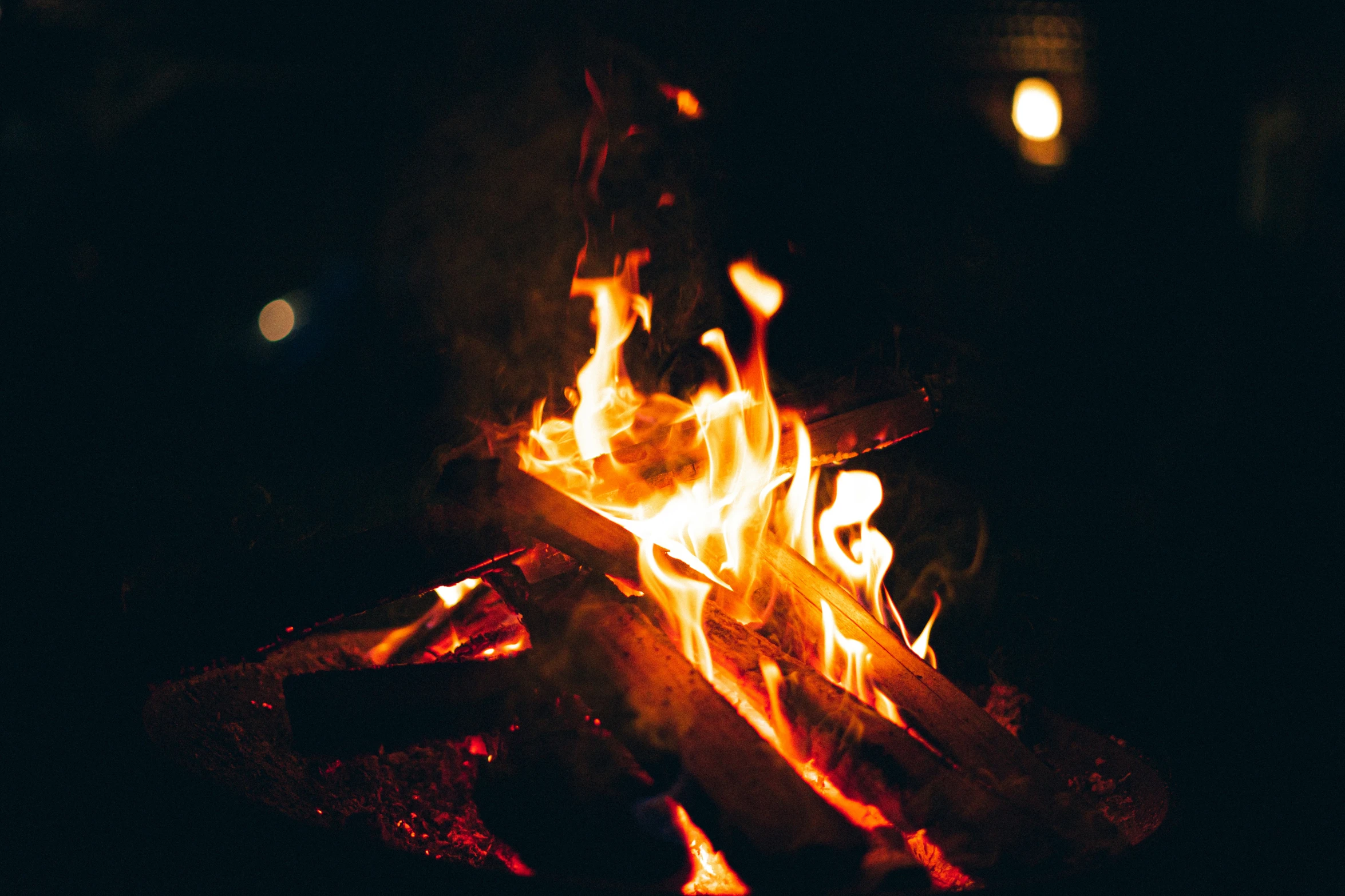 fire burning on a table in the dark