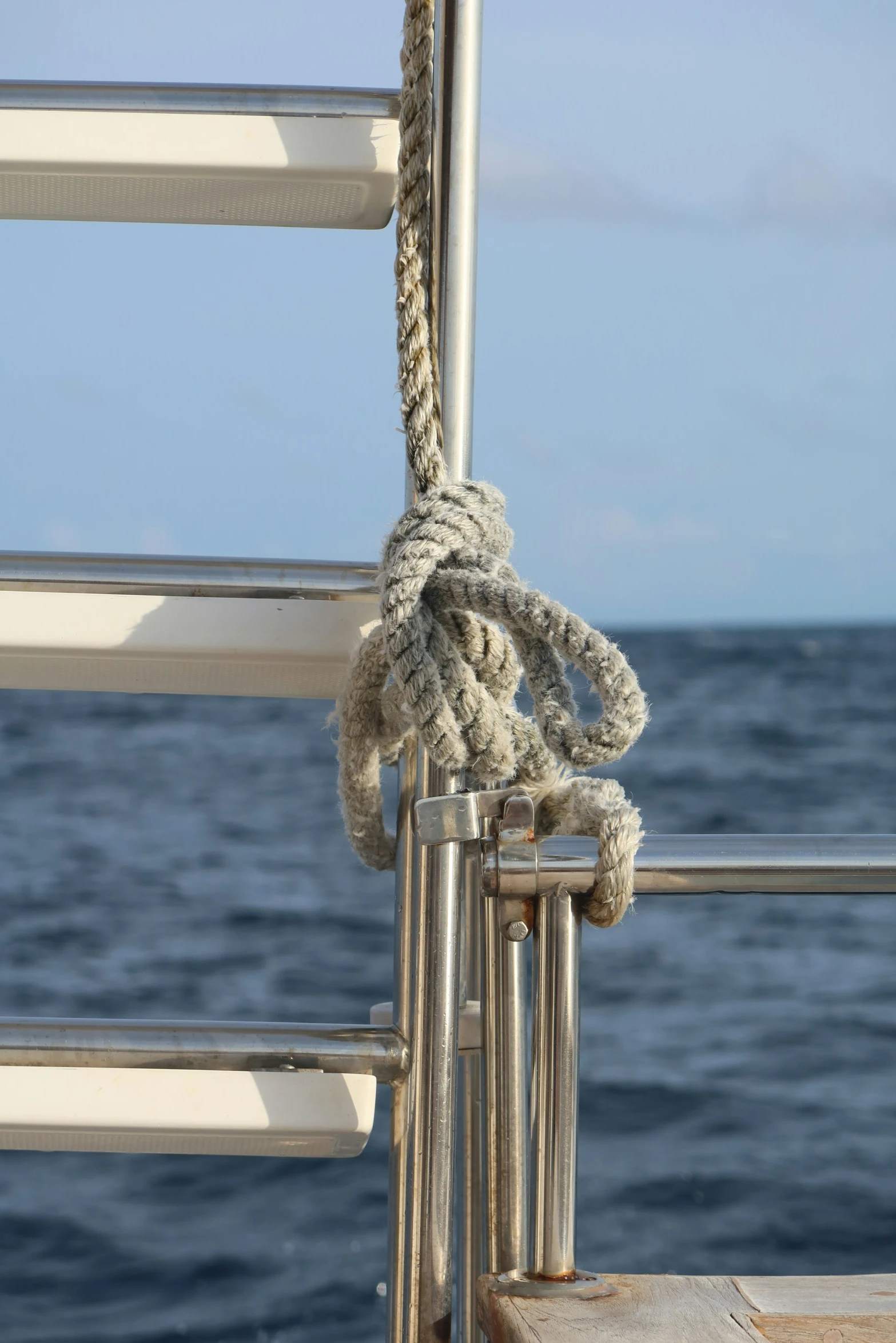 the rope is hanging from the ship