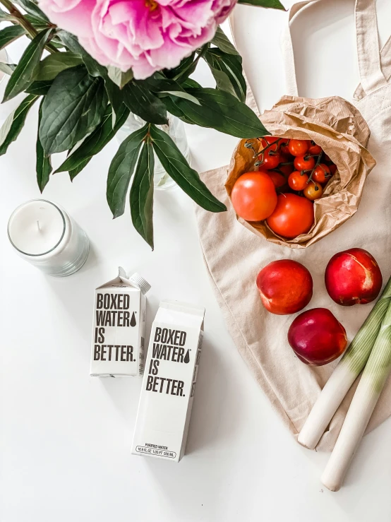 vegetables, a couple of packets and a bag on a table