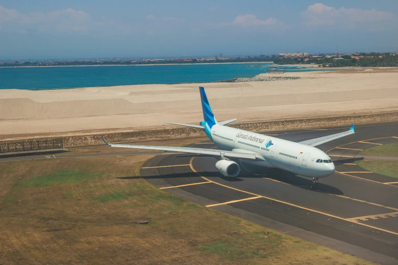 large passenger jet taking off from an airport runway