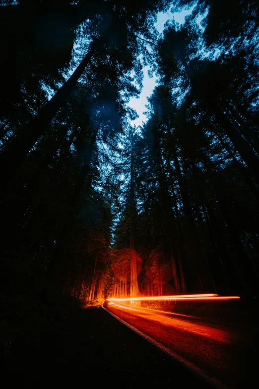 an image of a road at night time