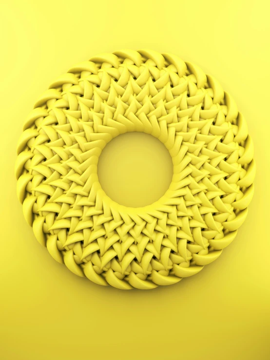 yellow abstract sculpture on a yellow background