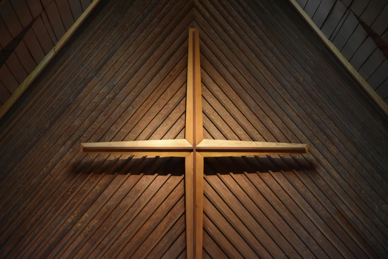 wooden cross with a metal band placed on top
