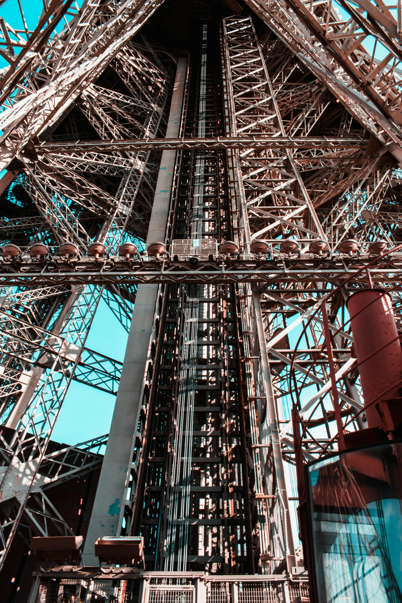 the view from the bottom of a metal structure