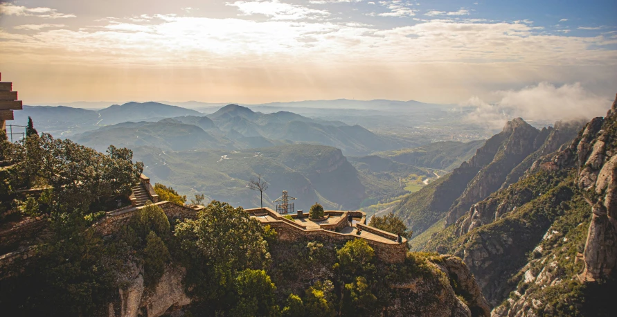 a view of the mountains from the top of a mountain