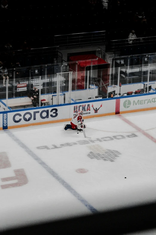 an ice hockey player is getting ready to take a s