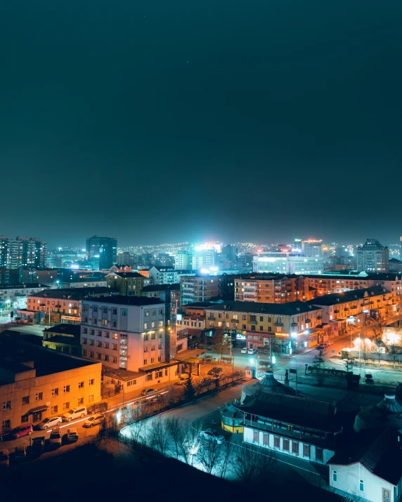 a skyline that has buildings with lots of lights on them