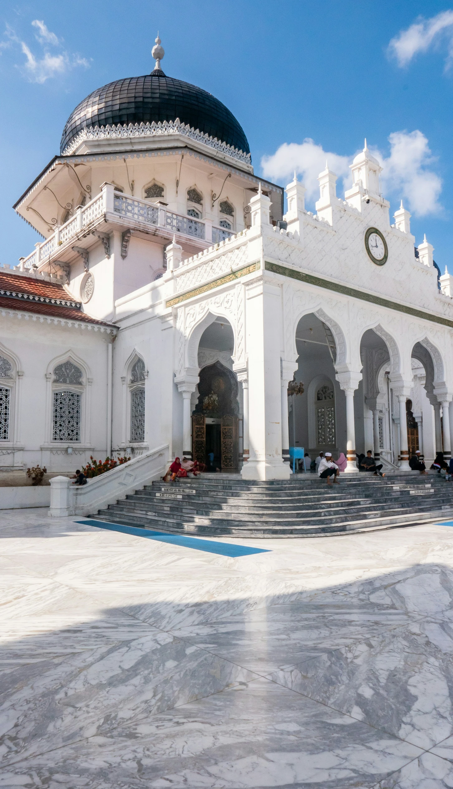 a building with large courtyard and several balconies