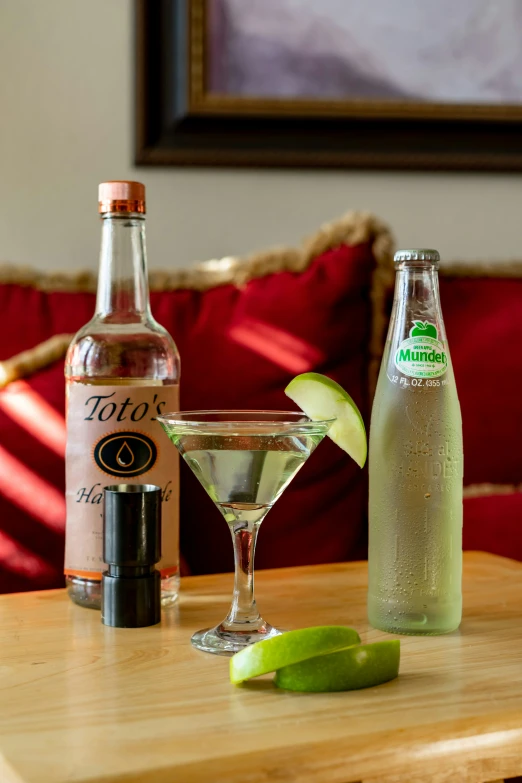 an assortment of alcoholic drink sits on a table