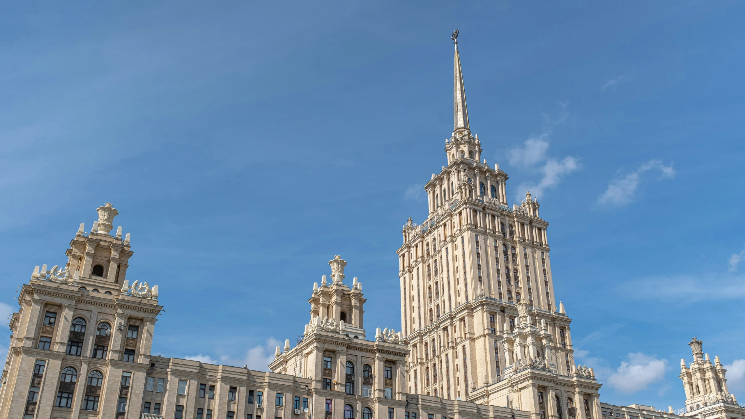 the top of a building with many tall towers