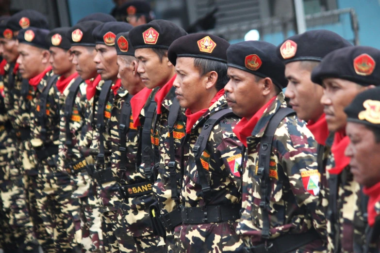 some soldiers are standing together in line