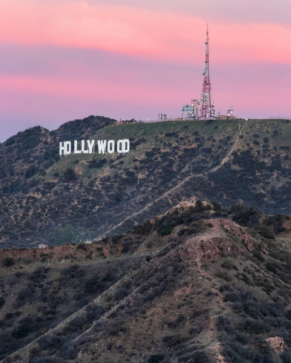 a view of hollywood with the hollywood sign behind