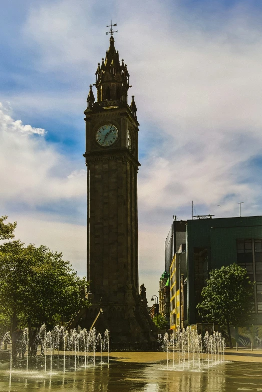 a tall clock tower towering over a city skyline