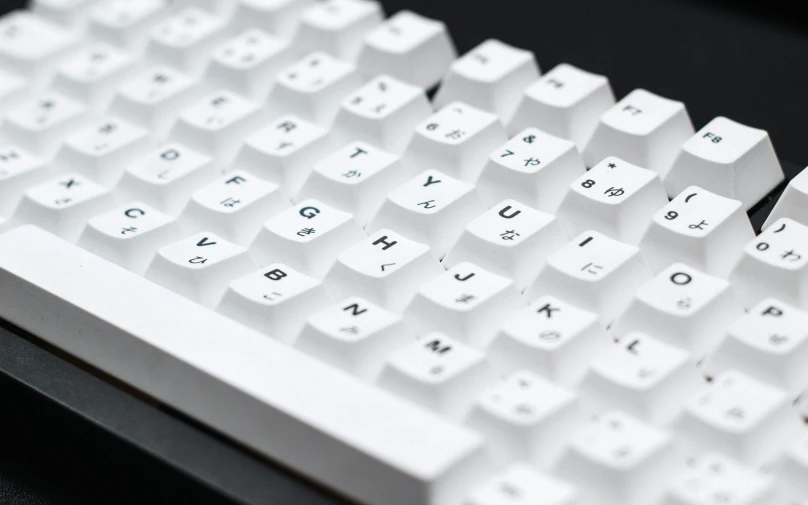 a close up of an apple keyboard with no keys