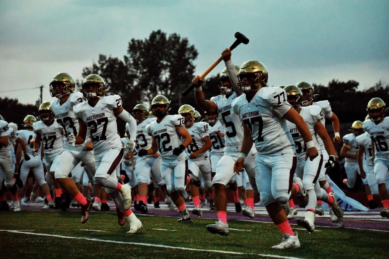 a group of men on a football field