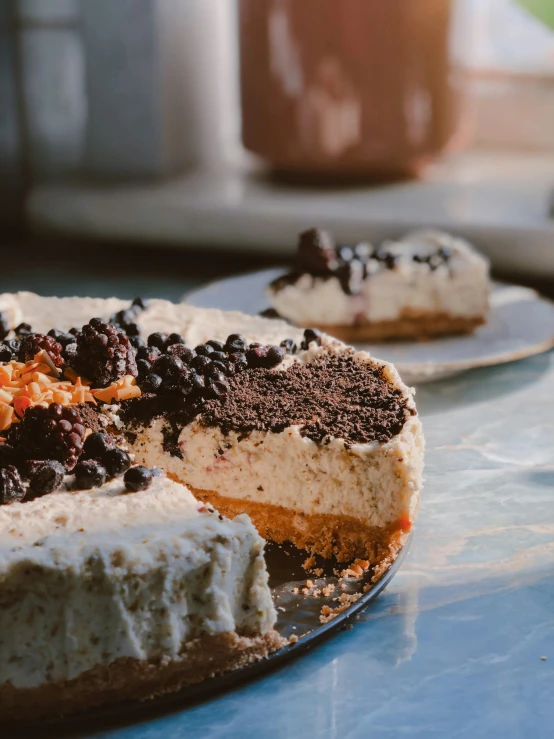 two slices of cake are sitting on plates on a table