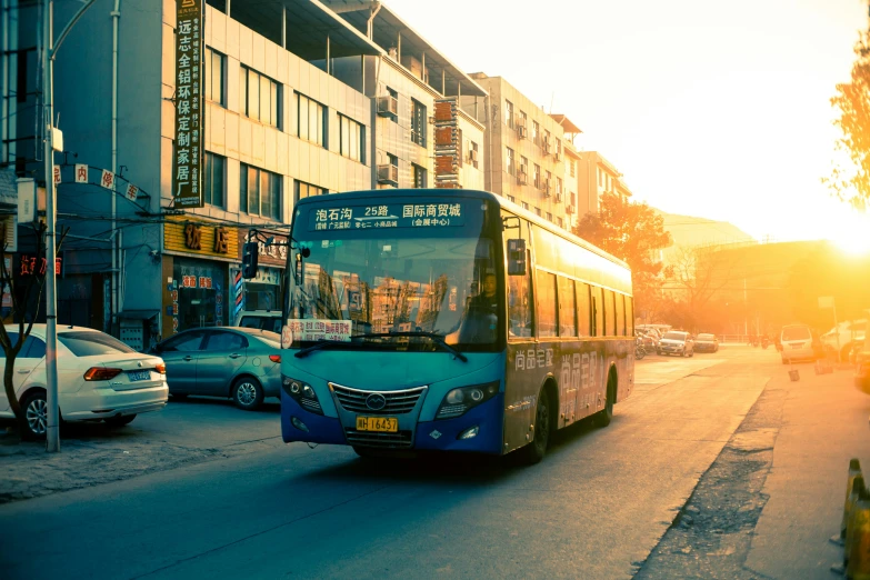 the city bus travels on the city street