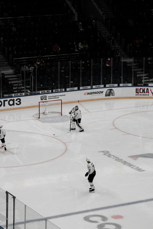 some hockey players on the ice playing ice hockey